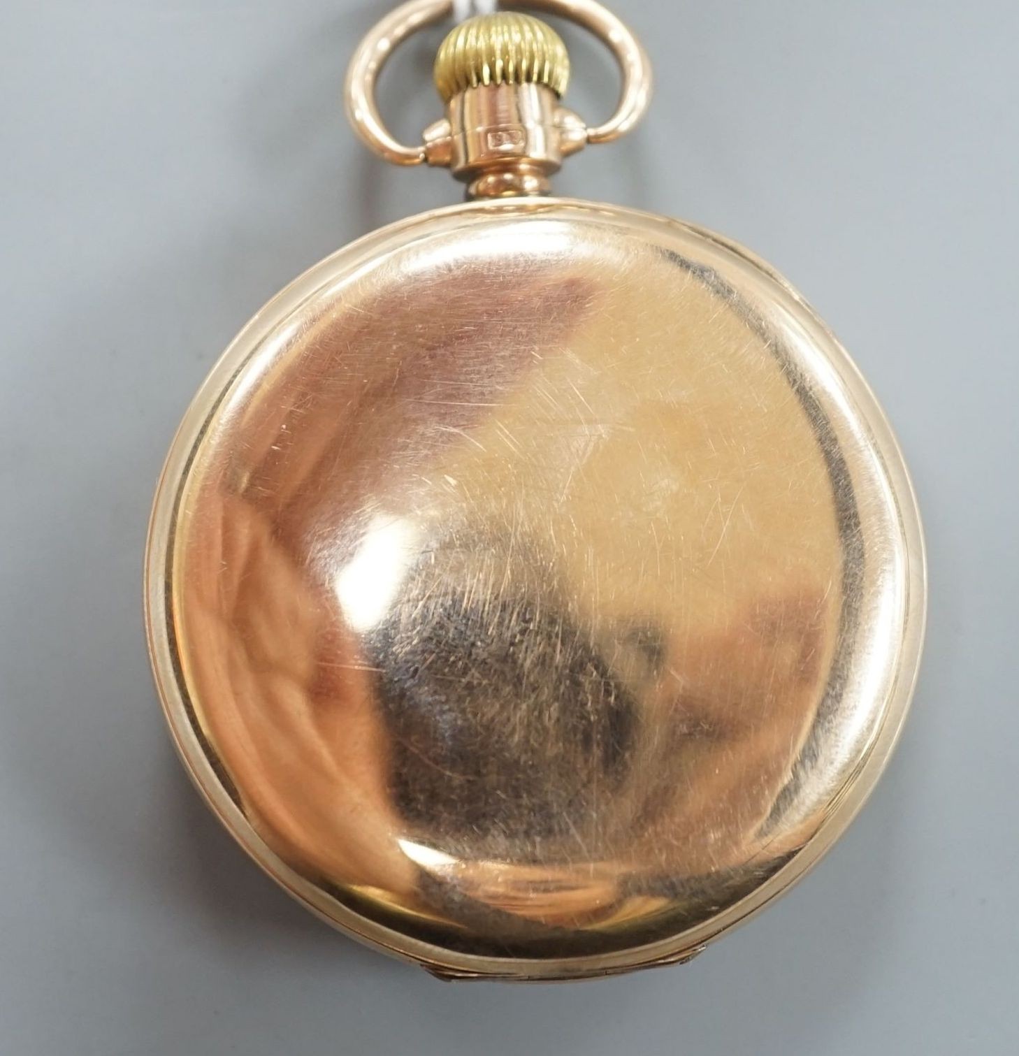A George V 9ct gold Cyma open face keyless pocket watch, with Roman dial and subsidiary seconds, case diameter 48mm, gross weight 74.2 grams.